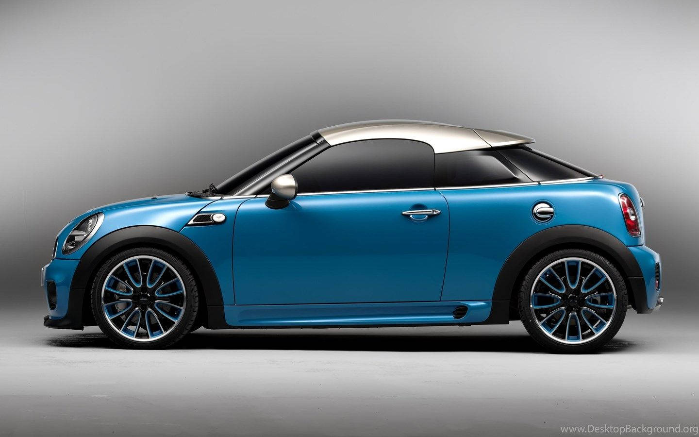 Caption: Standout Blue Mini Cooper In High Definition Wallpaper