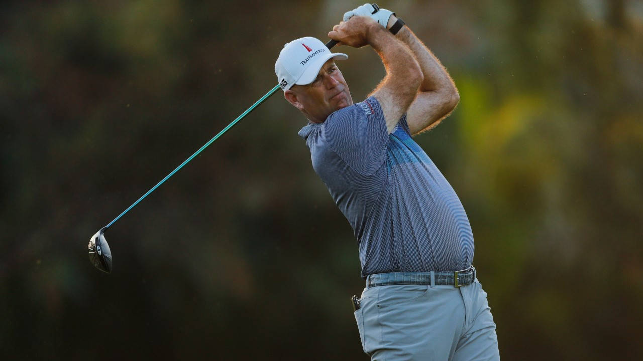 Caption: Stewart Cink In Mid Swing On The Green Wallpaper