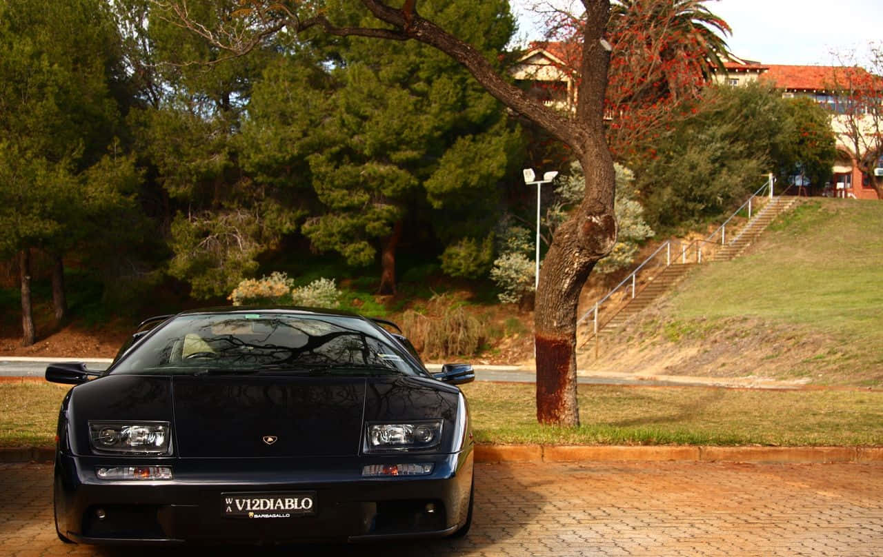 Caption: Stunning Lamborghini Diablo On The Road Wallpaper