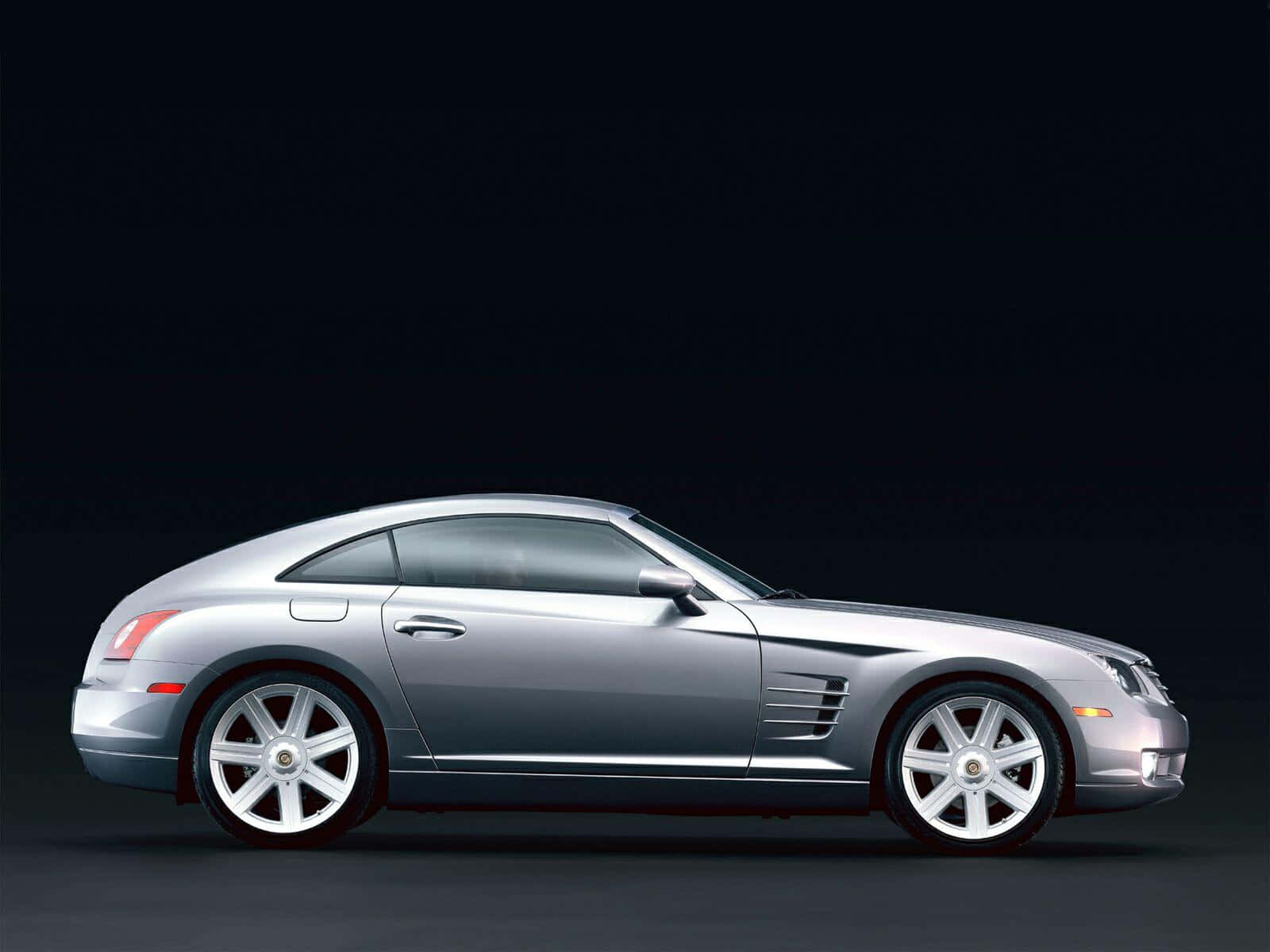 Caption: Stunning Red Chrysler Crossfire On The Road Wallpaper