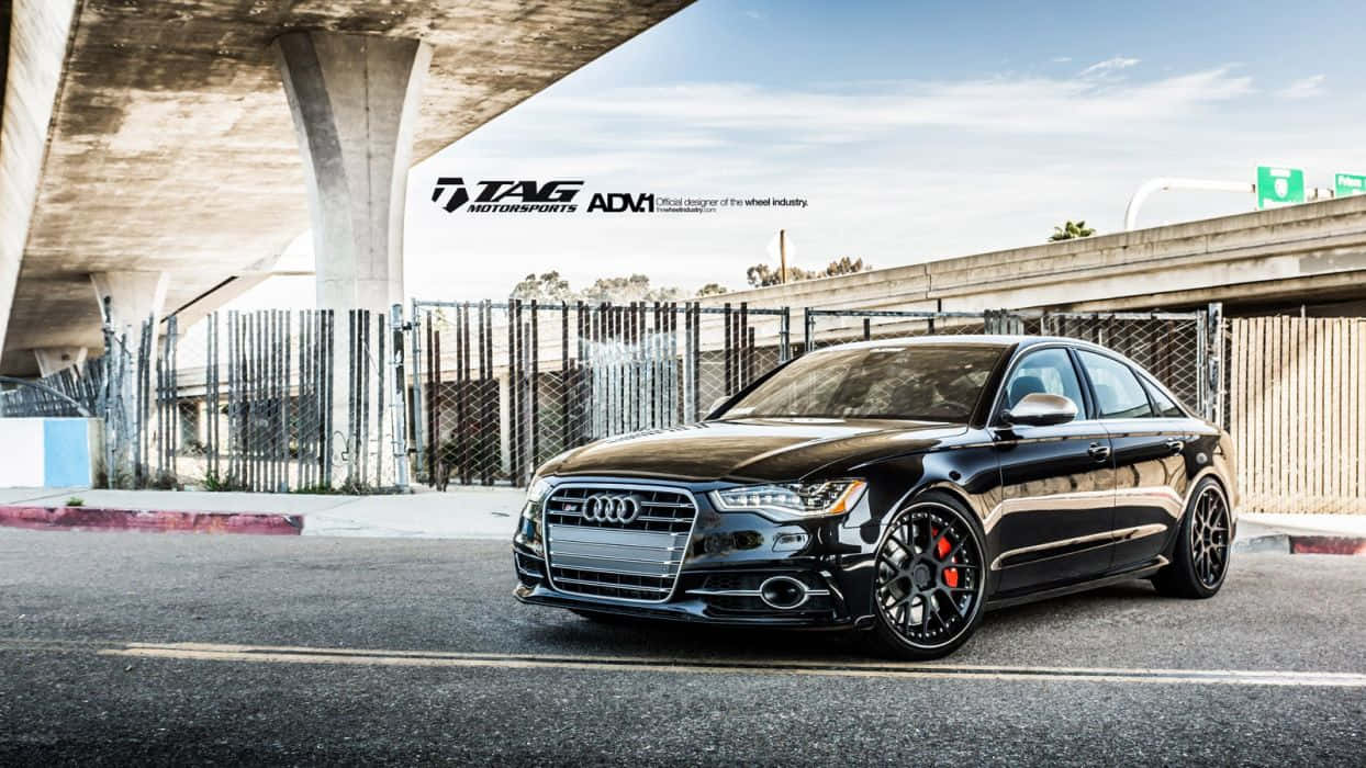 Caption: Stylish Audi S6 Showcasing Power And Elegance Wallpaper