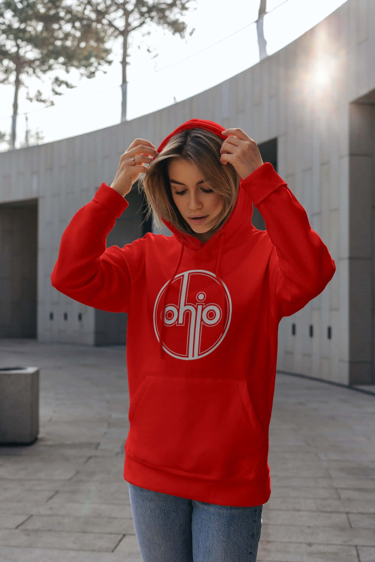 Caption: Stylish Red Hoodie On A Mannequin In A Shop Wallpaper