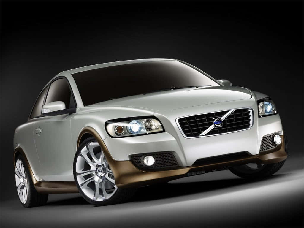 Caption: The Elegant Volvo C30 In Pure Daytime Sunlight Wallpaper