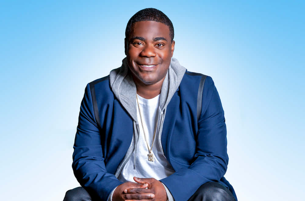 Caption: Tracy Morgan Smiling On Stage Wallpaper