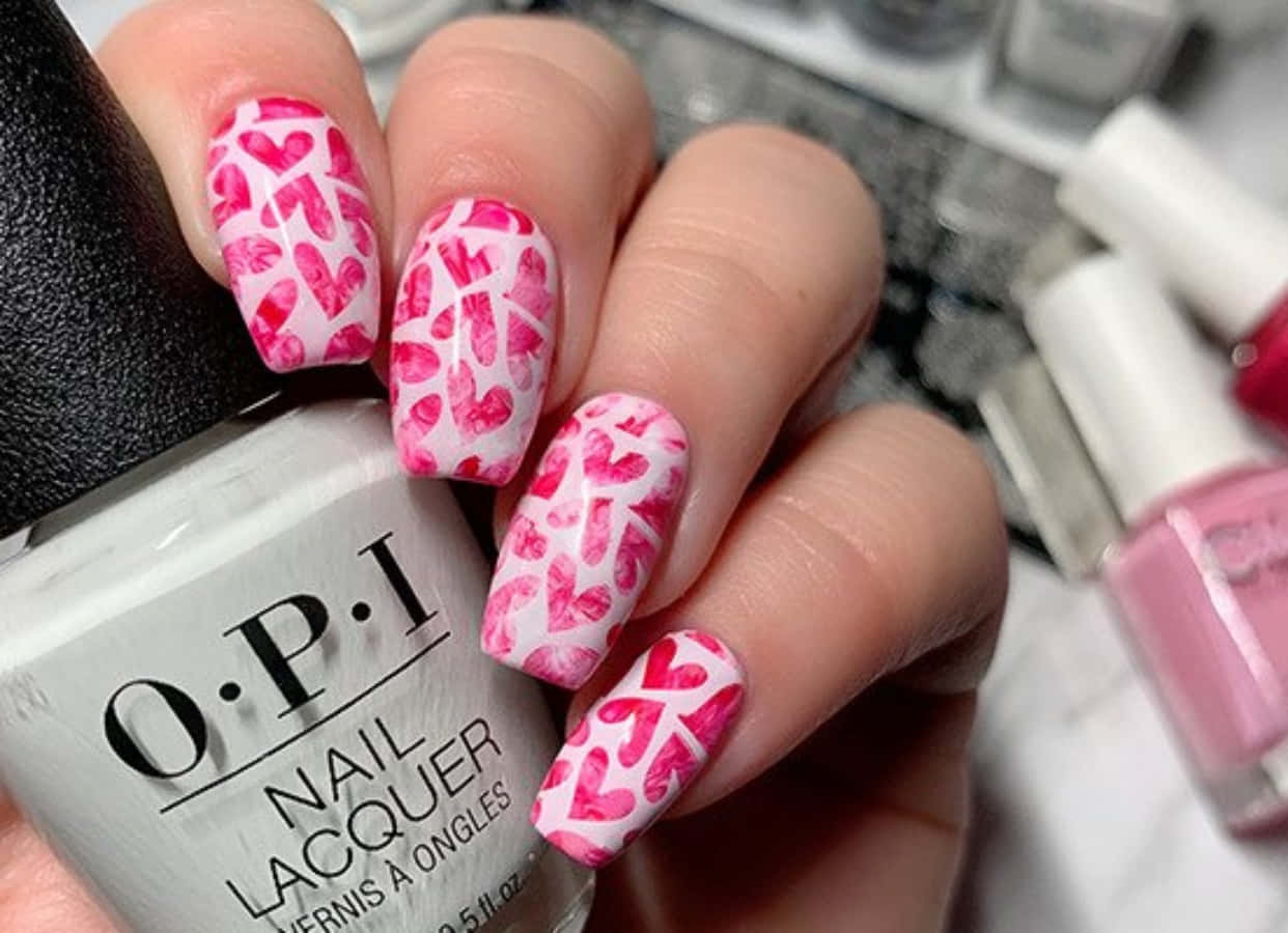 Caption: Trendy And Stylish Pink Nail Art Design Wallpaper