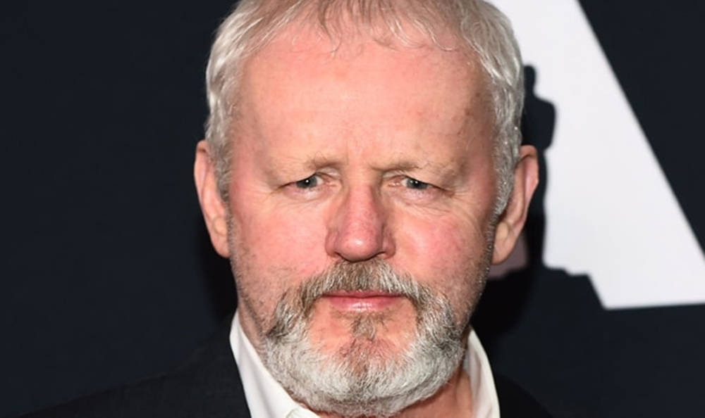 Caption: Veteran Actor David Morse With A Confused Expression And White Hair Wallpaper