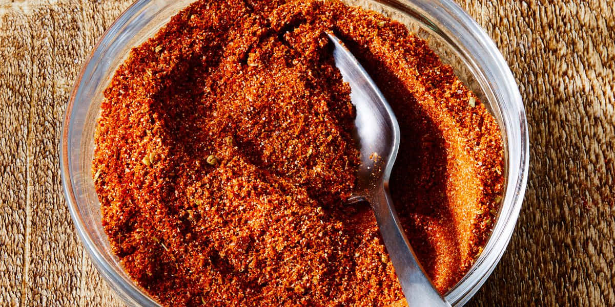 Caption: Vibrant Red Chili Powder Wallpaper