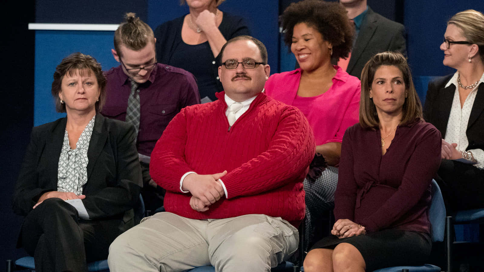 Caption: Woman In A Stylish Red Sweater Wallpaper