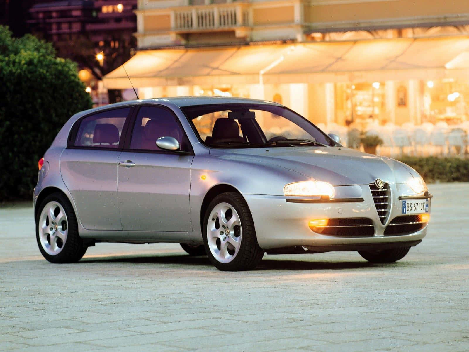 Captivating Alfa Romeo 147 In Sleek Red Wallpaper