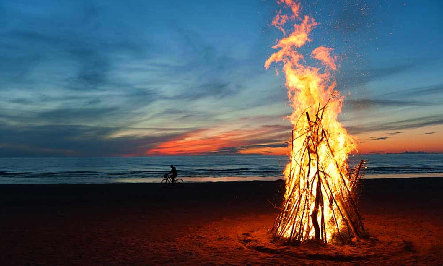 Captivating Beach Campfire Wallpaper