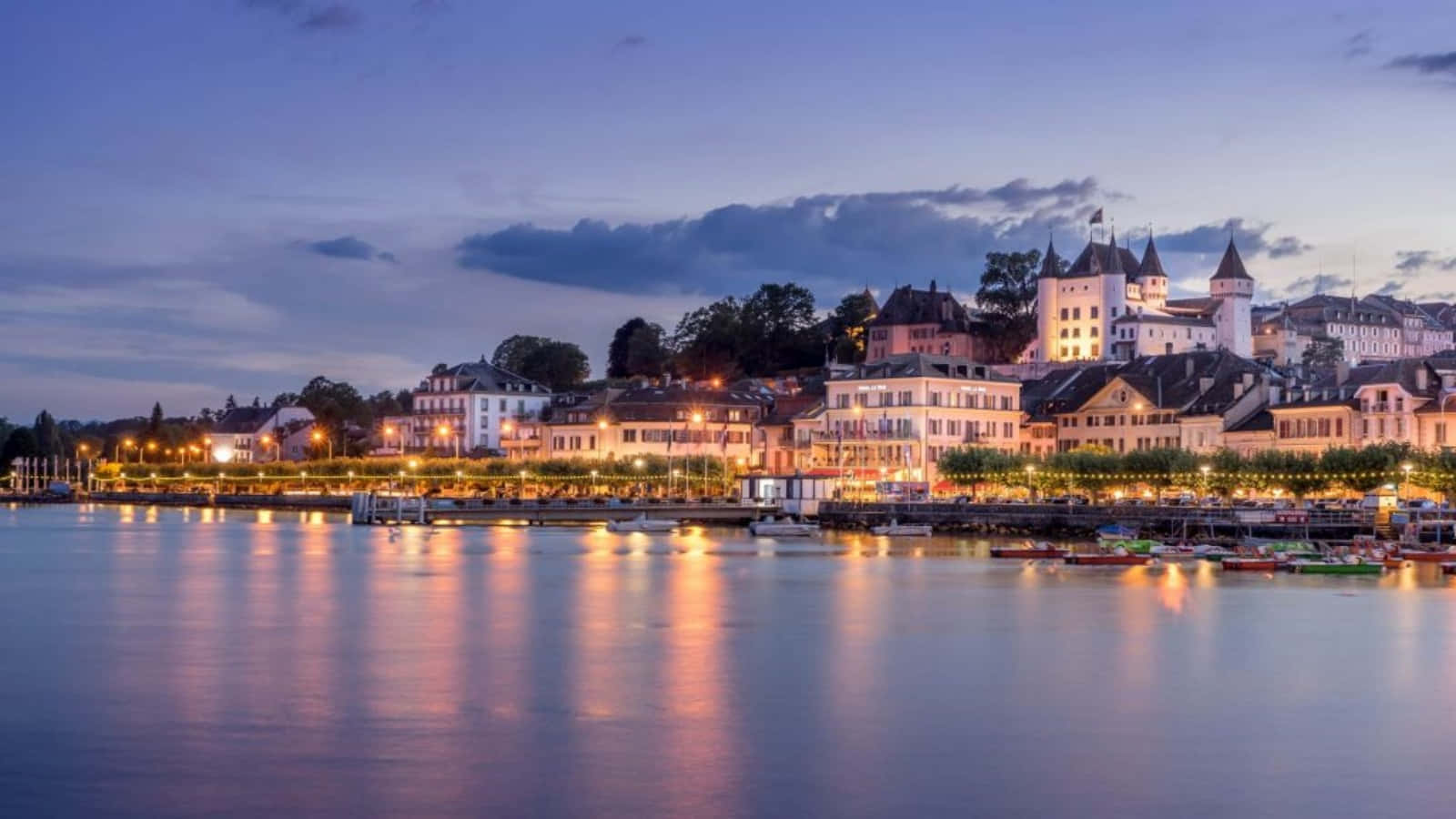 Captivating Blue Hour At Nyon Castle, Switzerland Wallpaper