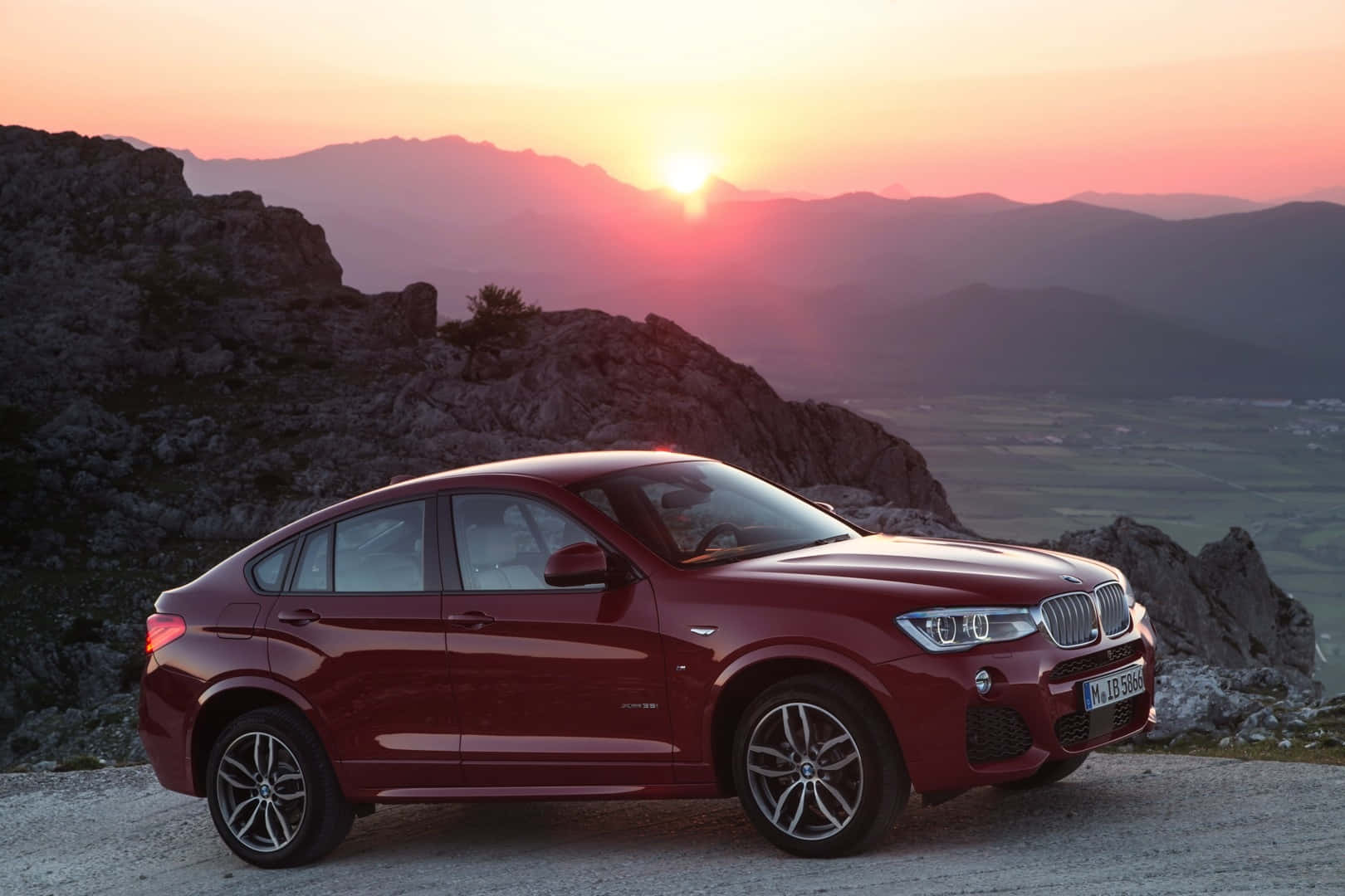 Captivating Bmw X4: A Blend Of Performance And Luxury Wallpaper