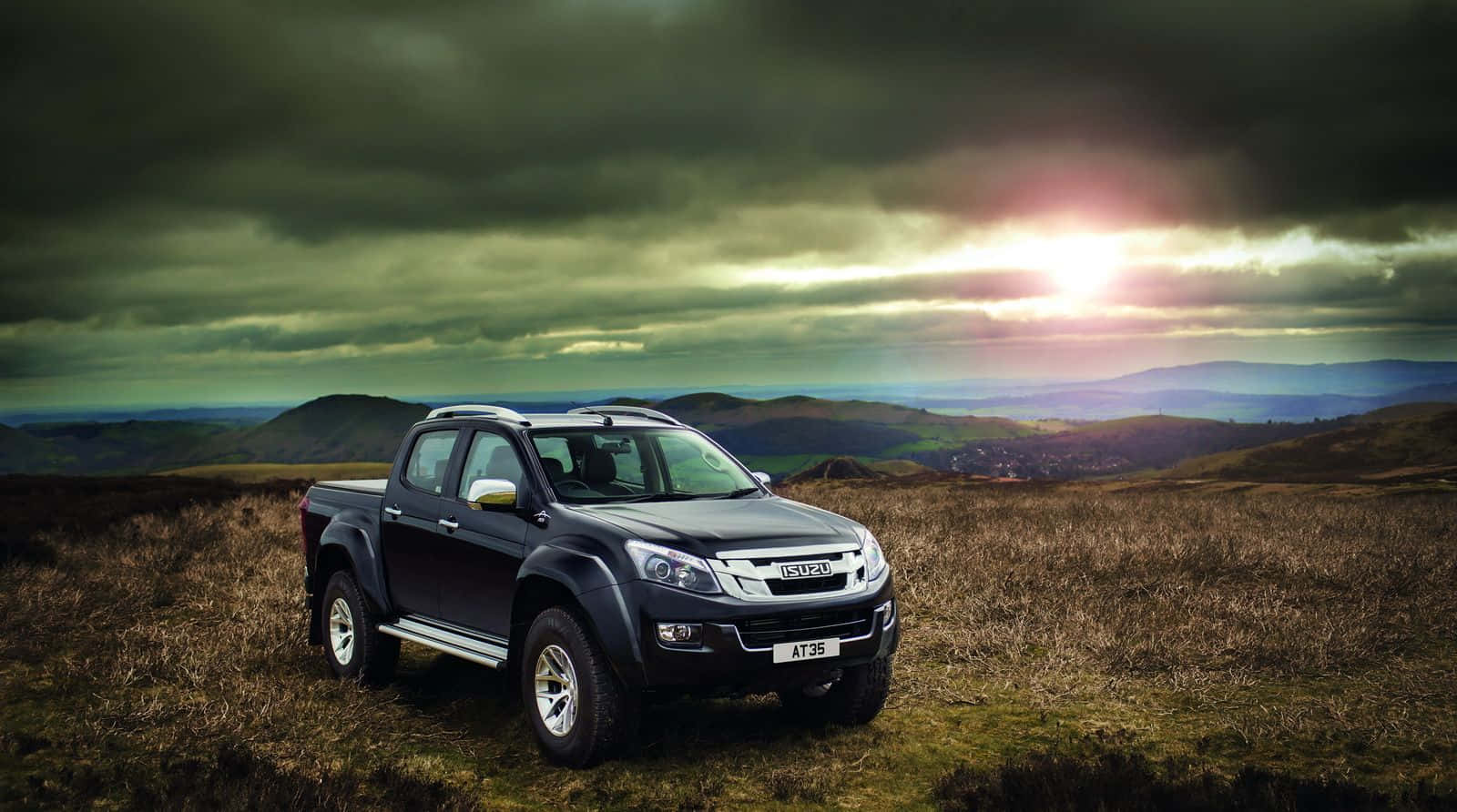 Captivating Isuzu Vehicle Showcased Outdoors Wallpaper