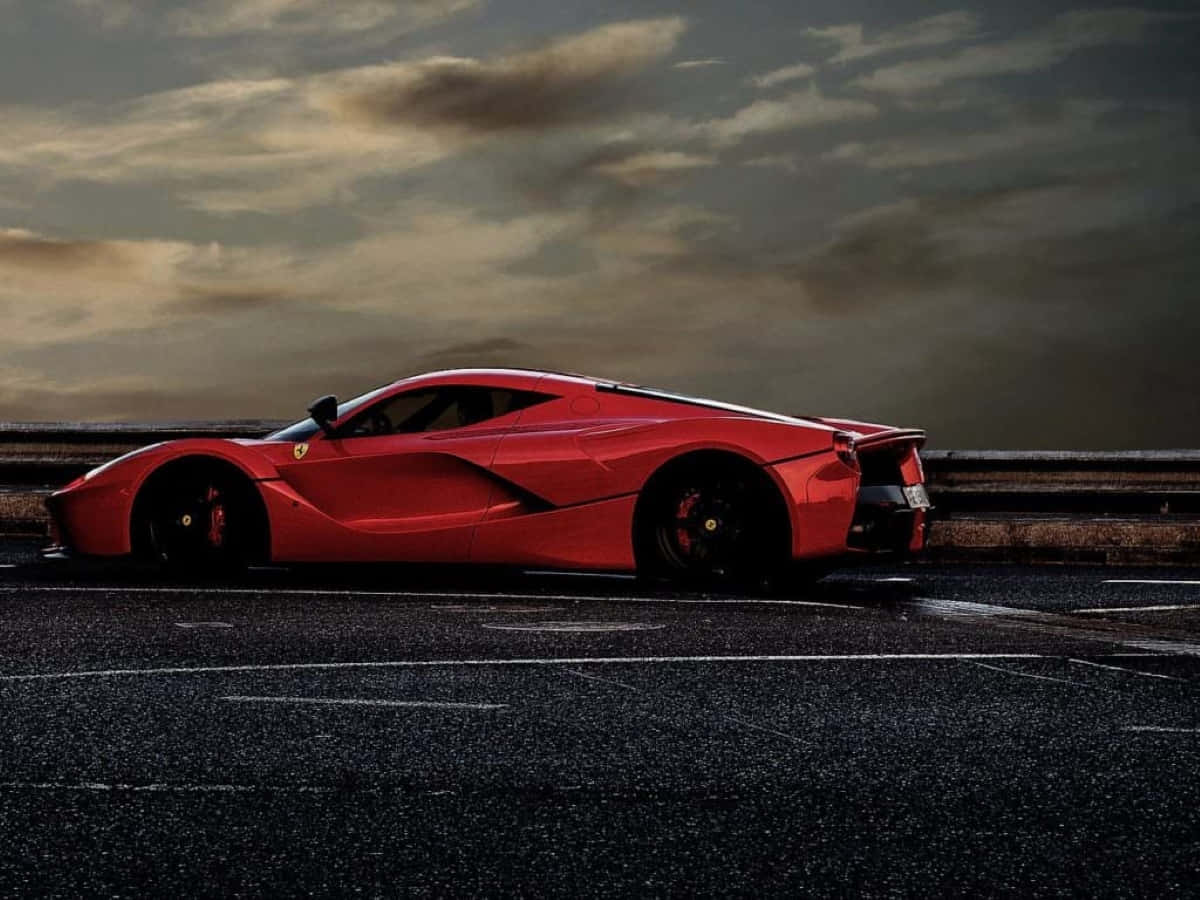 Captivating Red Ferrari Laferrari In Motion Wallpaper