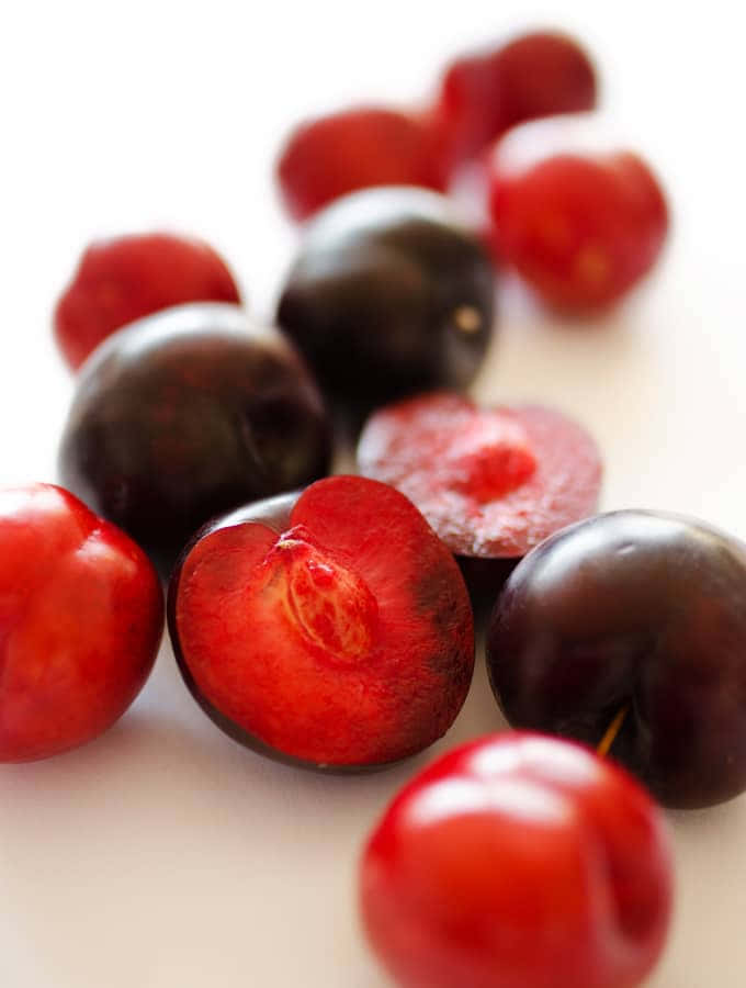 Captivating Red Plum Wallpaper