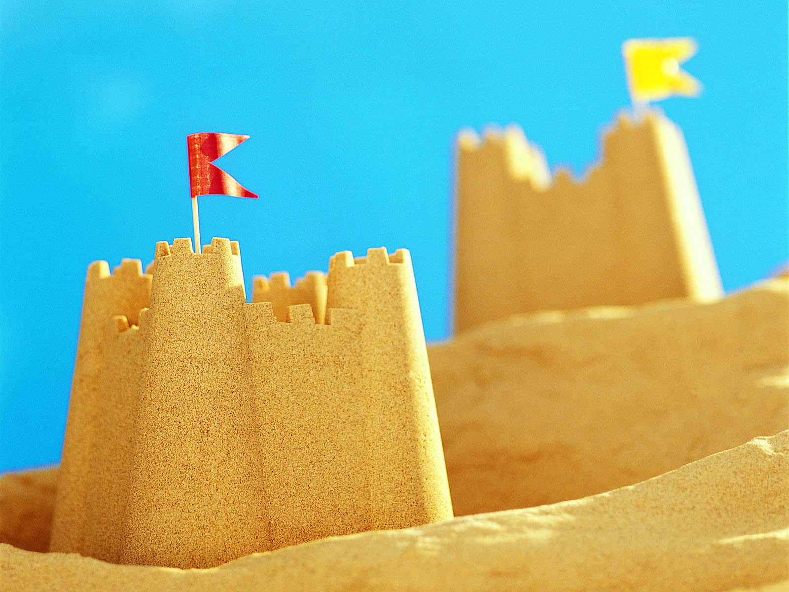 Captivating Sandcastle On A Beautiful Sunny Beach Wallpaper