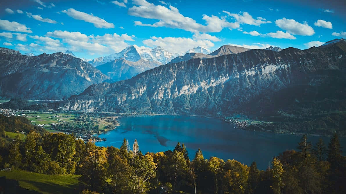 Captivating View Of Lake Thun, Switzerland Wallpaper