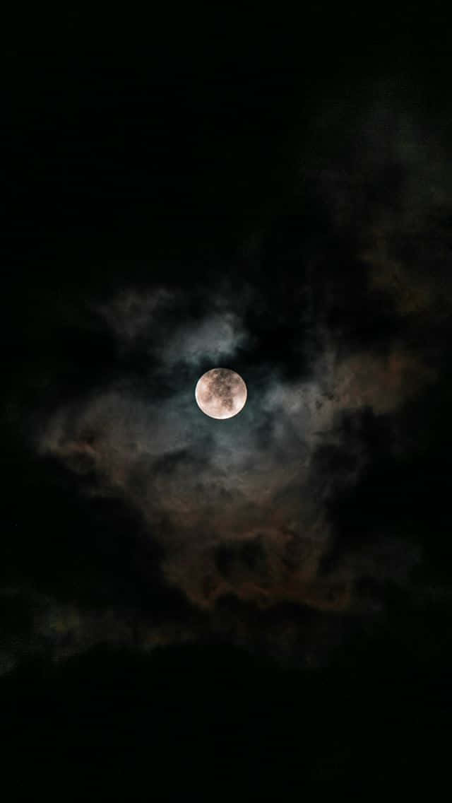 Capture A Piece Of The Night Sky With This Stunning Moon Iphone Wallpaper. Wallpaper