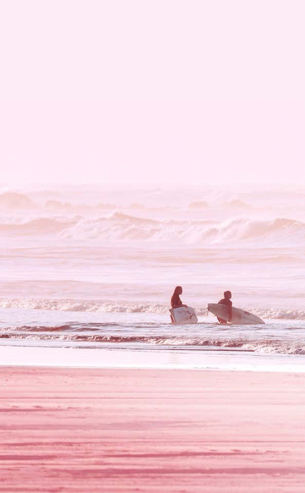 Catch The Dusk While Relaxing At The Pink Beach Aesthetic Wallpaper