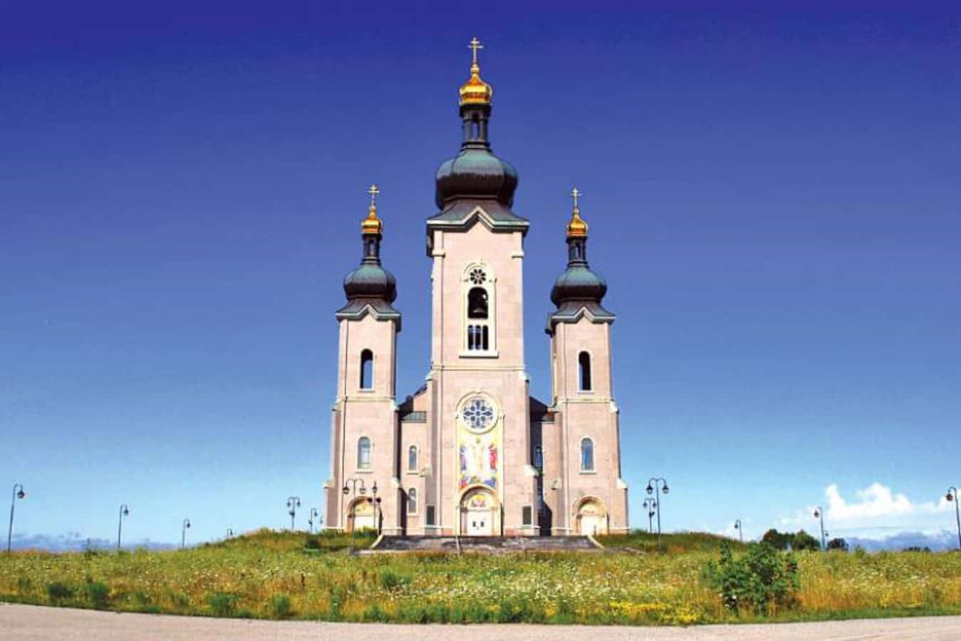 Cathedral Against Blue Sky Wallpaper