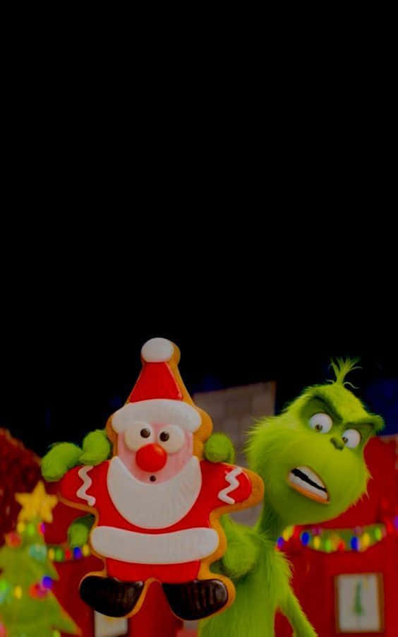 Celebrate Christmas In Style With The Grinch Christmas Iphone Wallpaper