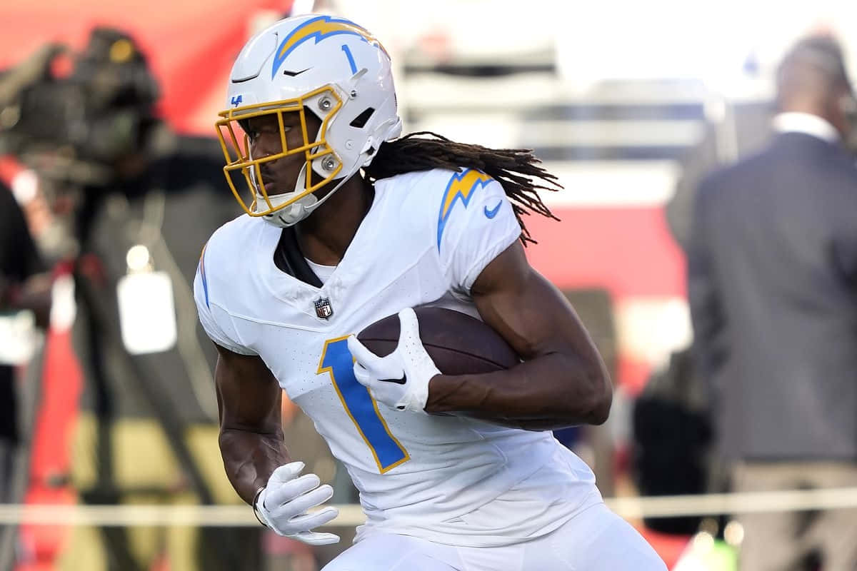 Chargers Player Running With Football Wallpaper