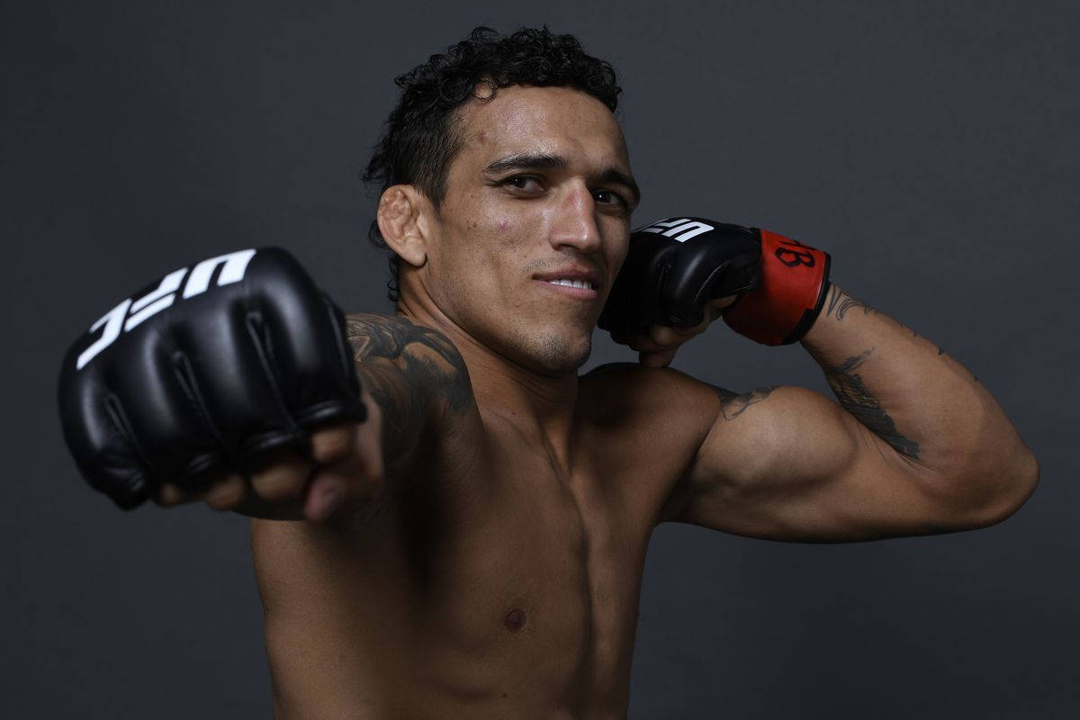 Charles Oliveira Fist Punch Wallpaper