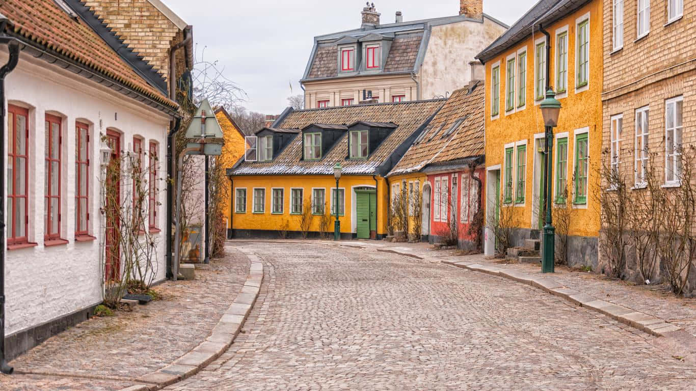 Charming Cobbled Street Lund Sweden Wallpaper