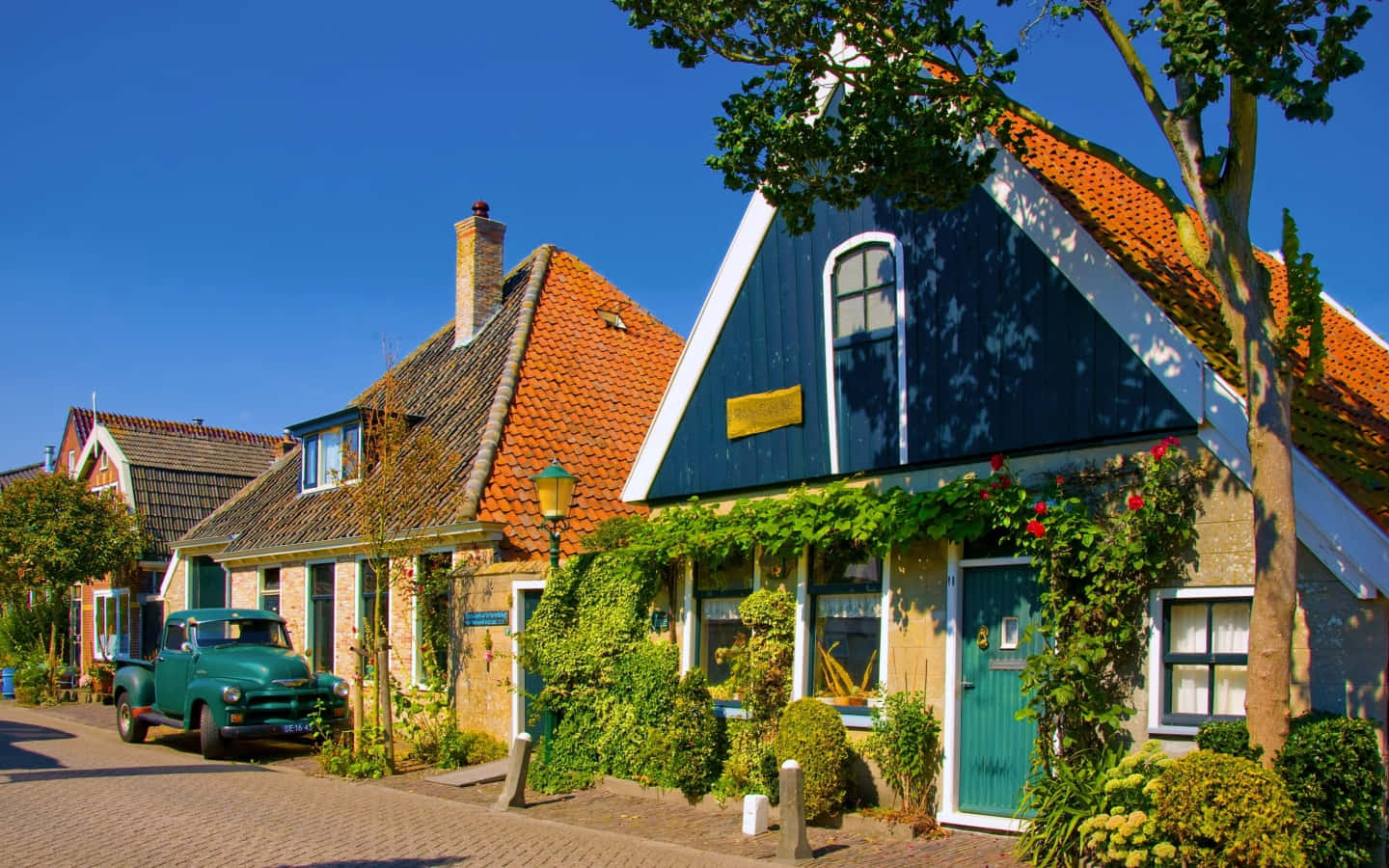 Charming Dutch Cottage Vintage Car Wallpaper