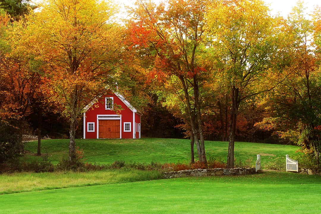 Charming Fall Farmhouse In Scenic Landscape Wallpaper