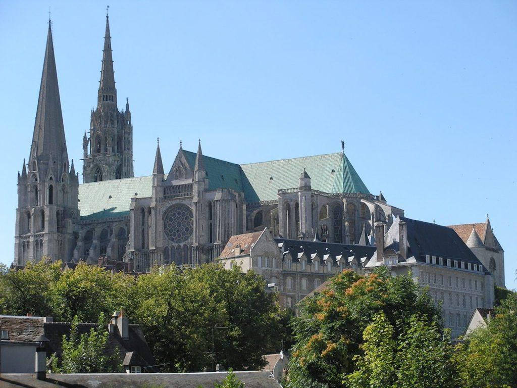 Chartres Cathedral Under Magnificent Sky Wallpaper