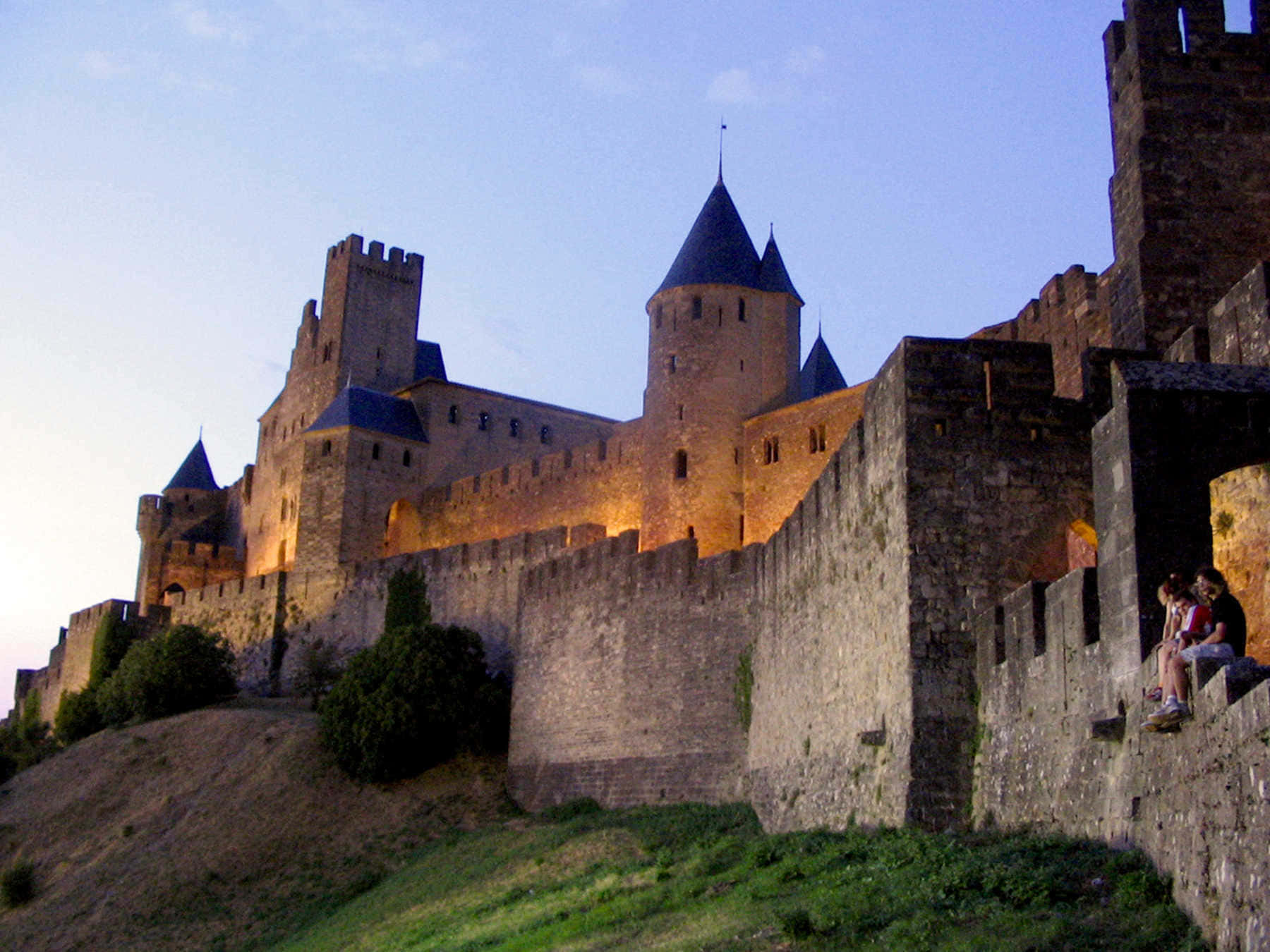 Chateau Comtal In Carcassonne With Lights Wallpaper