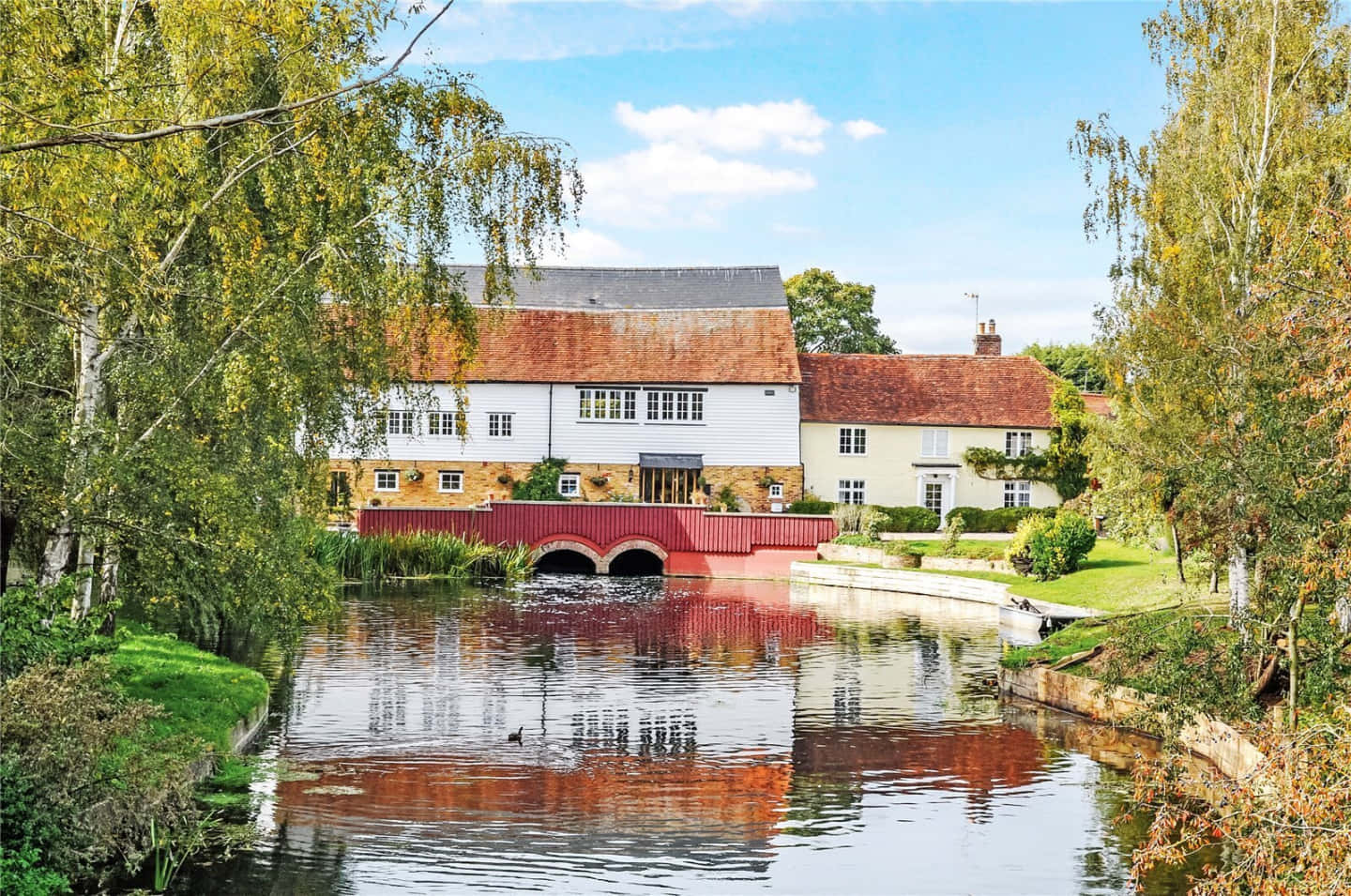 Chelmsford River Scenewith Red Bridge Wallpaper