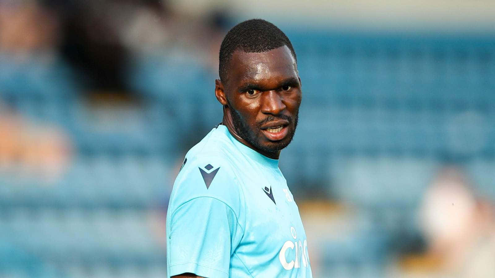 Christian Benteke Wearing Light Blue Jersey Wallpaper