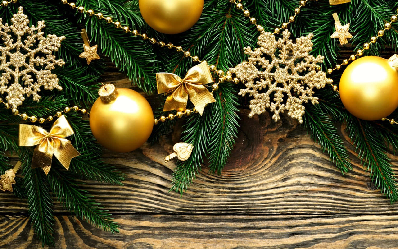 Christmas Decorations On A Wooden Background Wallpaper