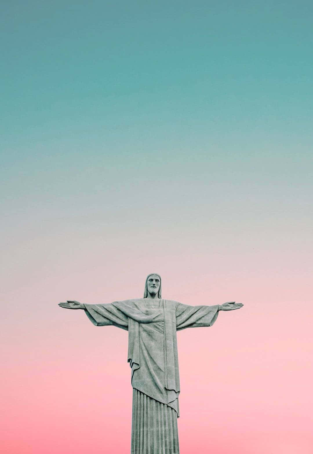 Christthe Redeemer Statueat Dusk Wallpaper