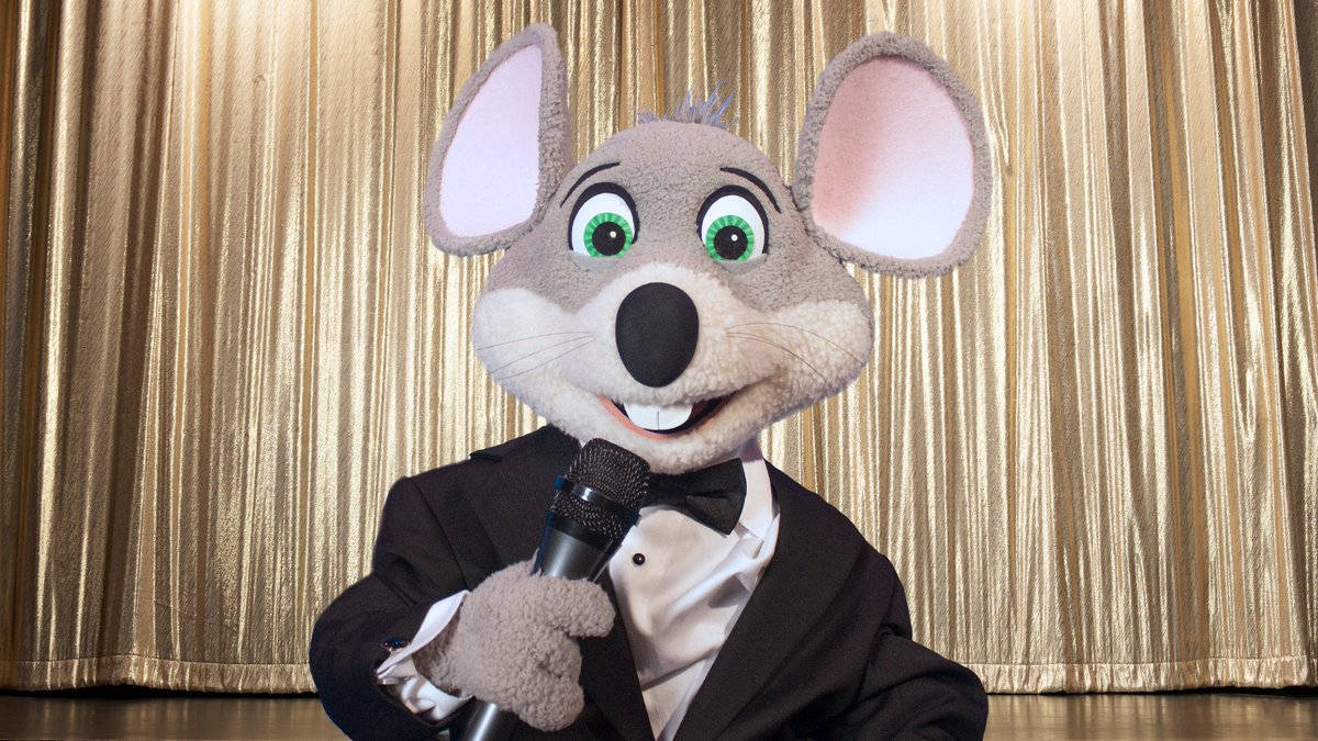 Chuck E Cheese Mascot In Suit Wallpaper