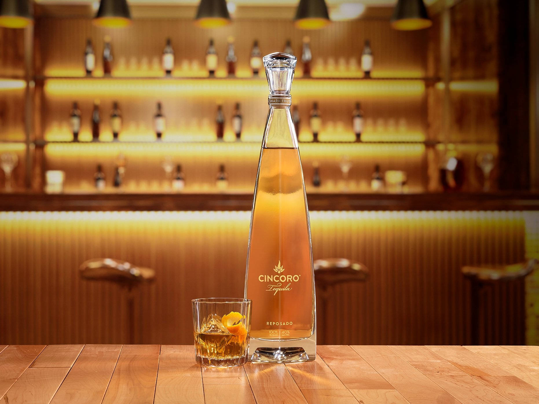 Cincoro Tequila Reposado Bottle On Bar Wallpaper