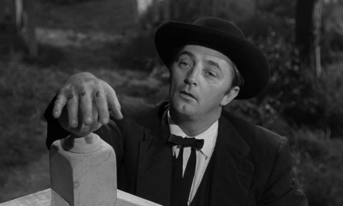 Cinematic Confluence: A Profound Still Of Robert Mitchum From 