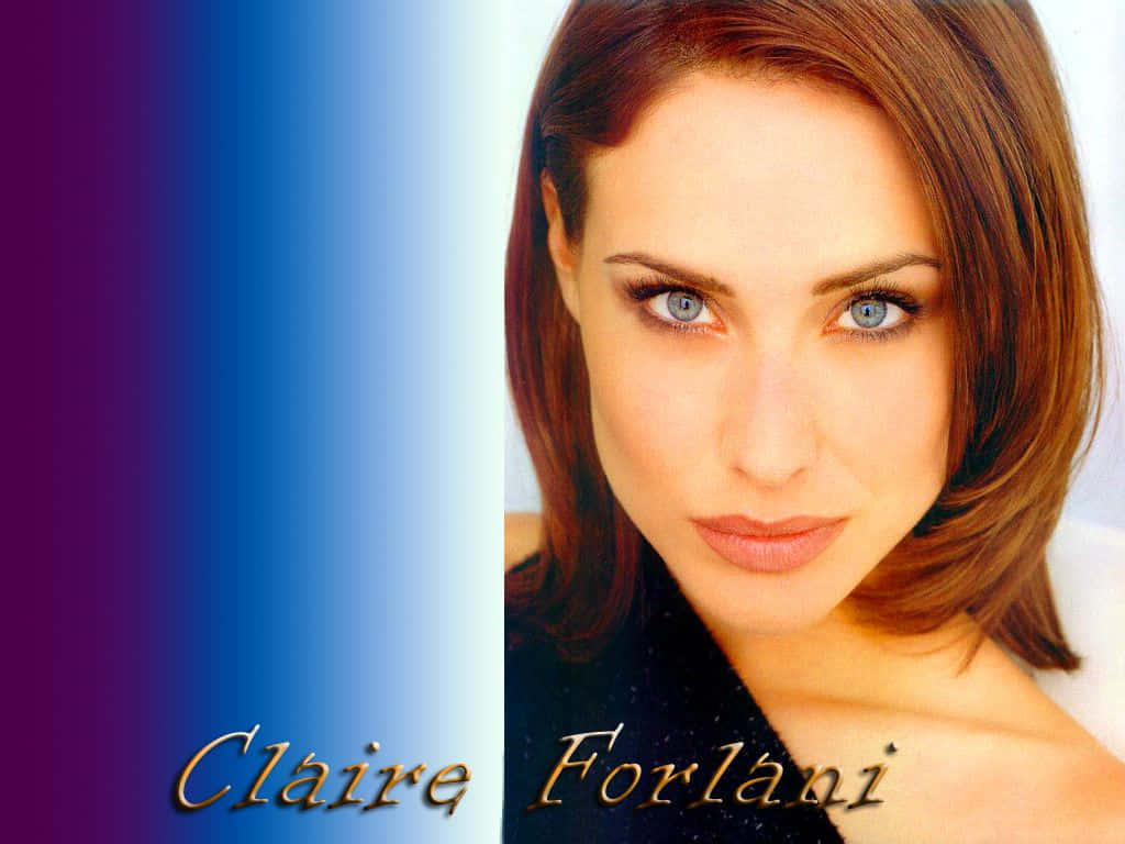 Claire Forlani Posing Elegantly In A Portrait Wallpaper