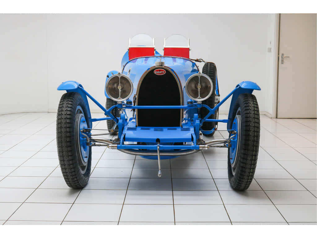 Classic Beauty: The Timeless Elegance Of The Bugatti Type 35 Wallpaper