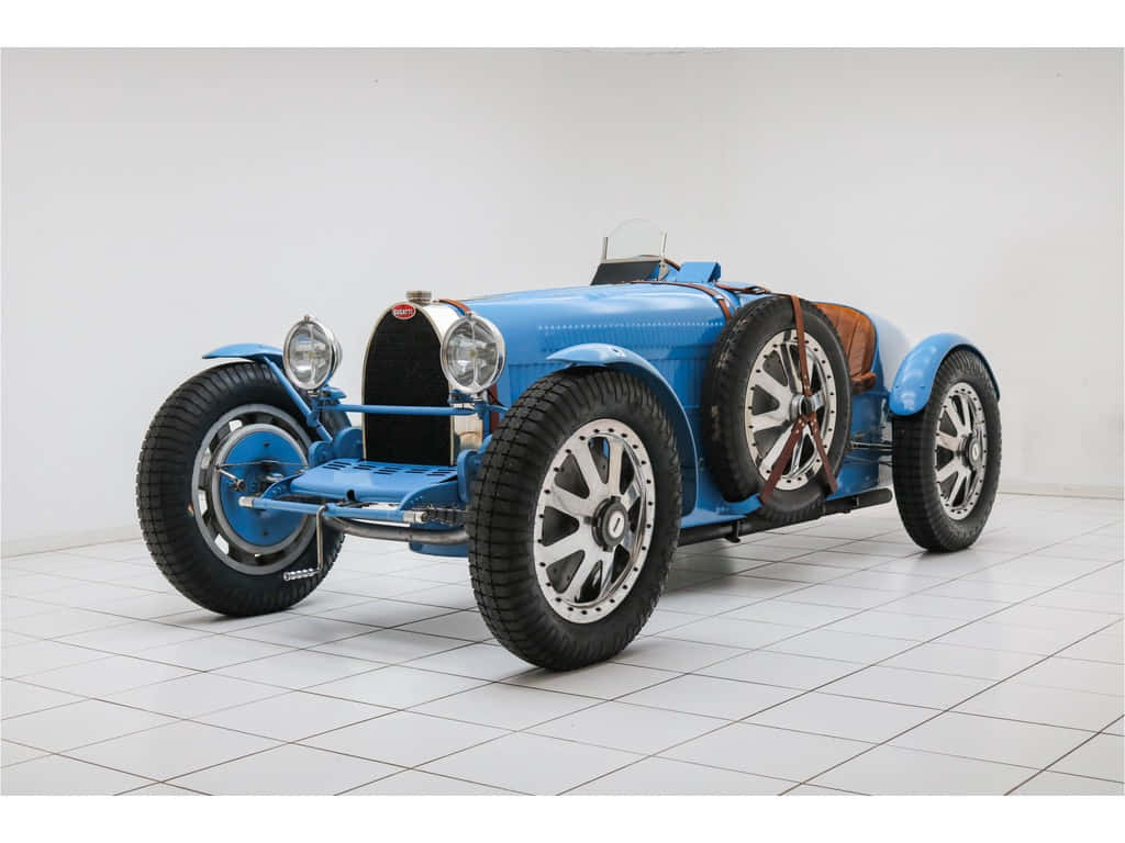 Classic Bugatti Type 35 Race Car In Action Wallpaper