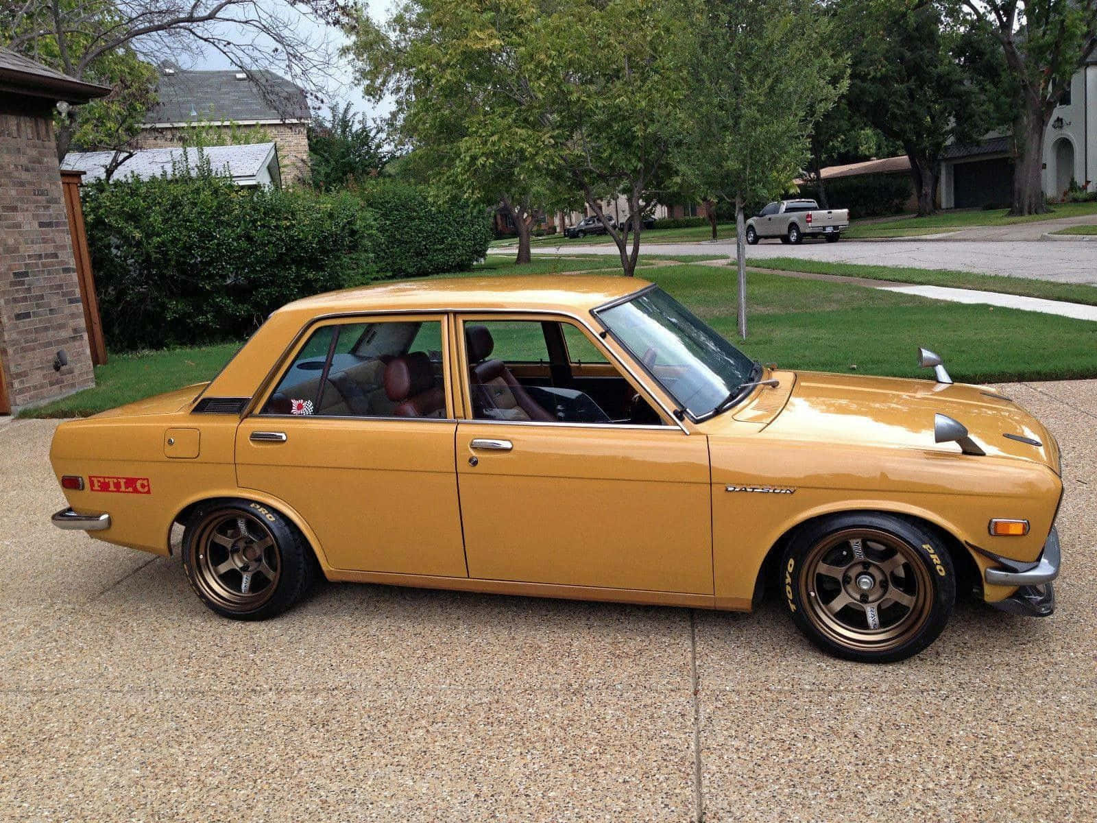 Classic Datsun 510 - Vibrant Red Wallpaper