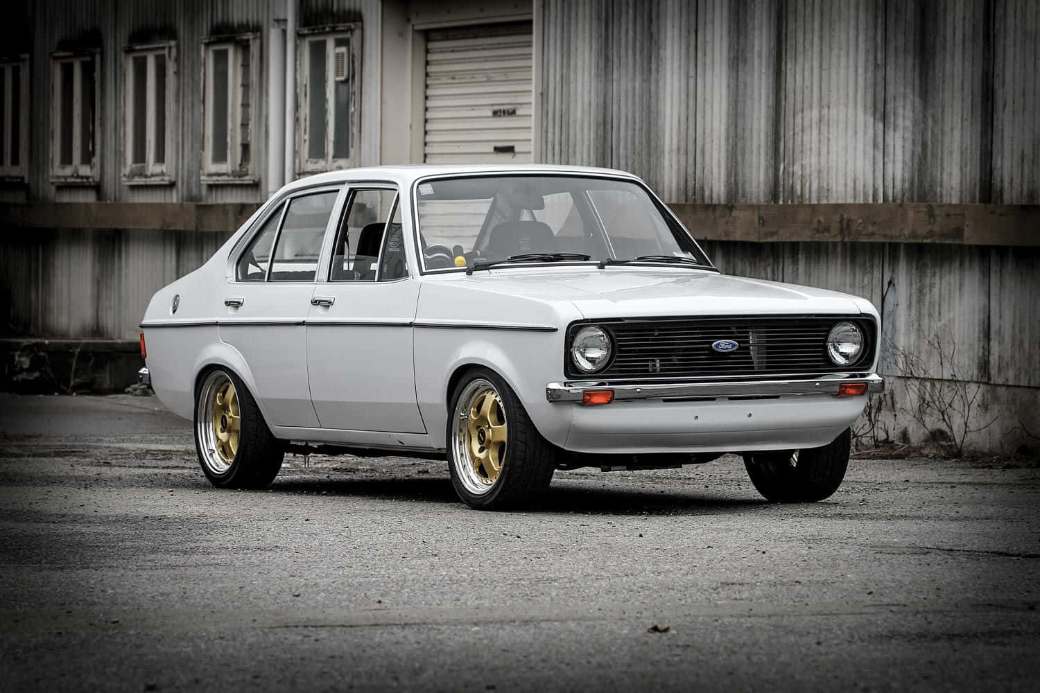 Classic Ford Escort On The Road Wallpaper