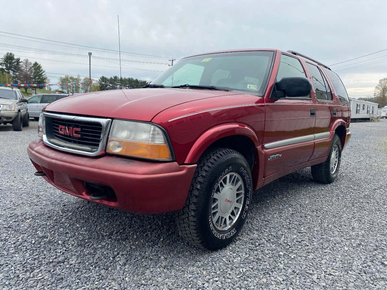 Classic Gmc Jimmy On Display Wallpaper