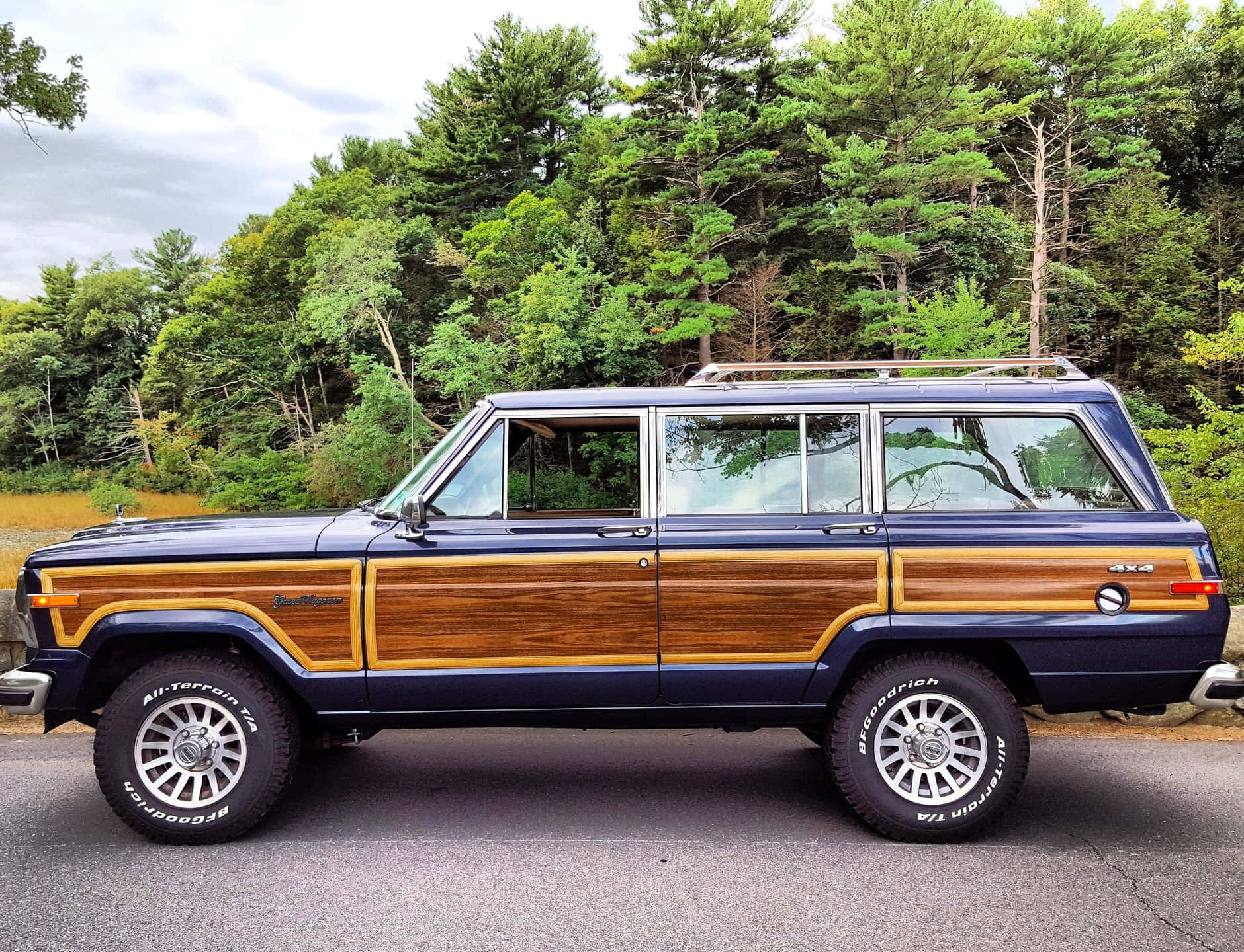 Classic Jeep Wagoneer Off-roading Adventure Wallpaper