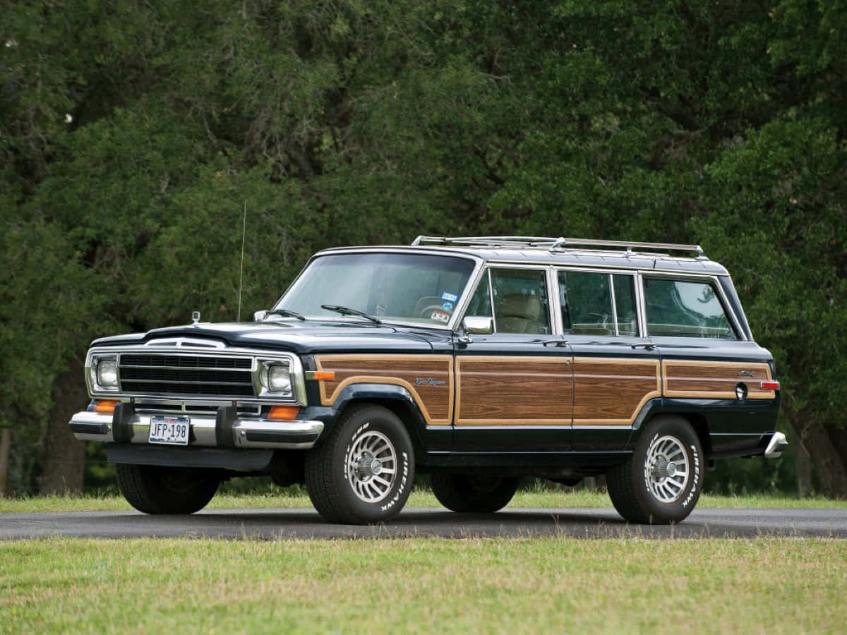 Classic Jeep Wagoneer Off-roading Adventure Wallpaper