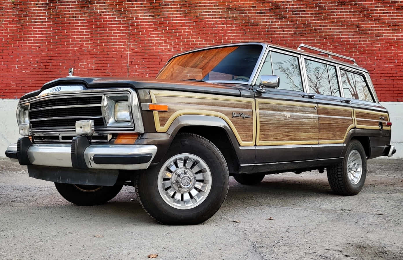 Classic Jeep Wagoneer Off-roading Adventure Wallpaper