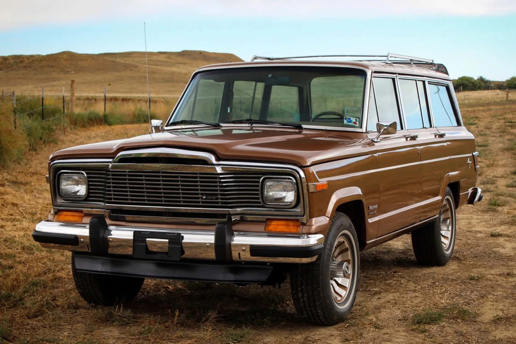 Classic Jeep Wagoneer On An Off-road Adventure Wallpaper