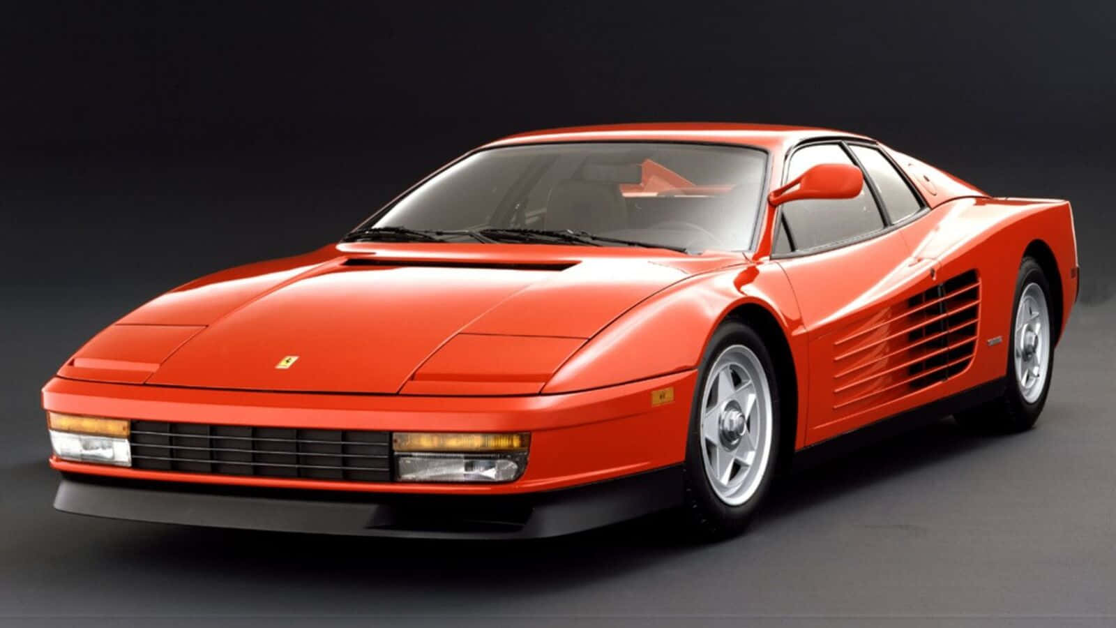 Classic Red Ferrari Testarossa In Its Full Glory. Wallpaper